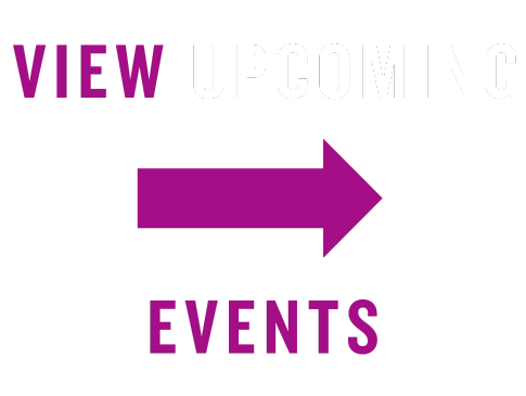 women at a table, cheering